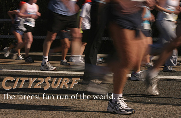 Runners' feet pounding the asphalt.