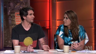 Todd Sampson wearing an Aboriginal flag t-shirt