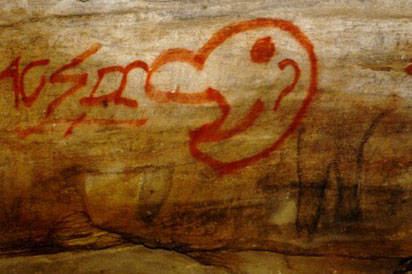Aboriginal art destroyed by graffiti.