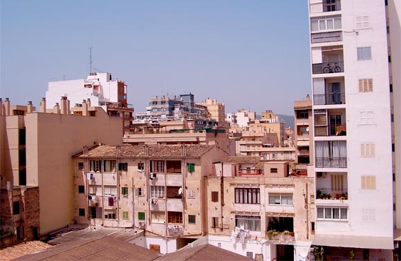 Densely built concrete houses with no trees in-between.