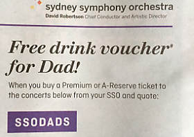 Detail of an advertising campaign saying "Free drink voucher for dad!"