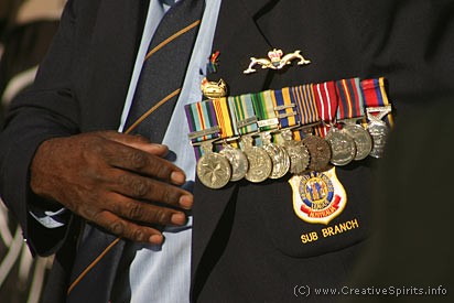 Coloured Digger on Anzac Day displaying his medals.