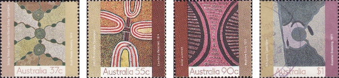 Four stamps showing paintings of desert art.