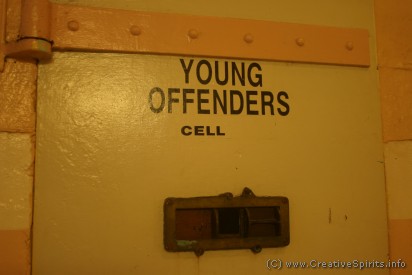 Mandatory sentencing: An armed prison cell door labelled 'Young offenders cell'.