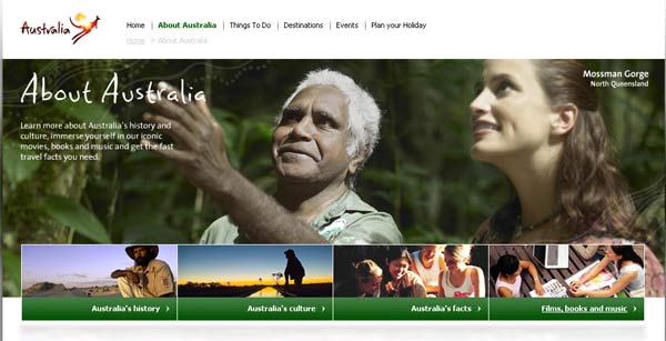 Screenshot of australia.com showing an Aboriginal tour guide with a white visitor.