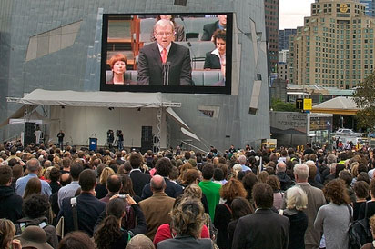 A crowd of people viewing Kevin Rudd's apology on a big screen, Federation Square, Melbourne
