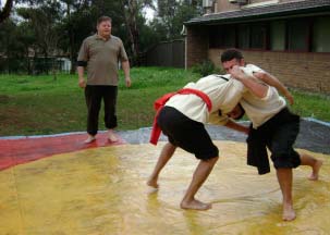 Two men fighting Coreeda - Traditional Aboriginal wrestling