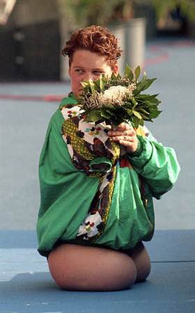 Tracy Lee Barrell holding flowers.tr
