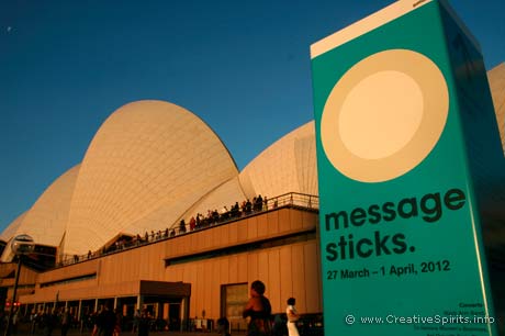 Message Sticks Indigenous Film Festival - Opera House and a sign of the festival bathed in late afternoon sun.