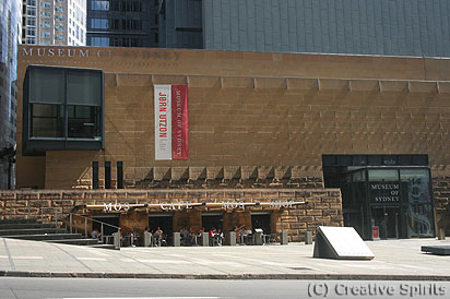Museum of Sydney (MOS). Note the white pavers on the footpath which outline the first Government House.